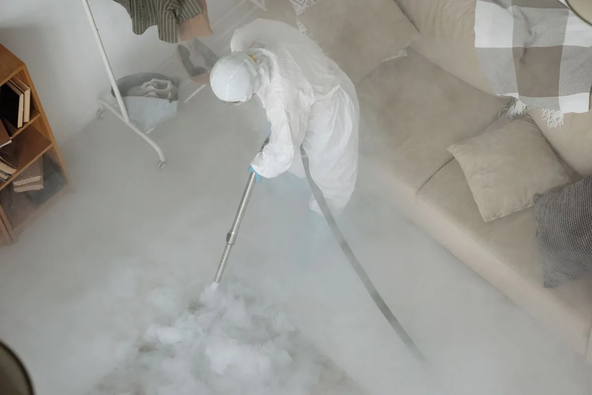 Biohazard cleanup technician in protective equipment, Handley, Fort Worth, TX